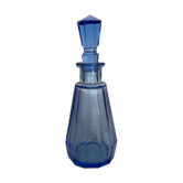 Blue chiseled glass bottle