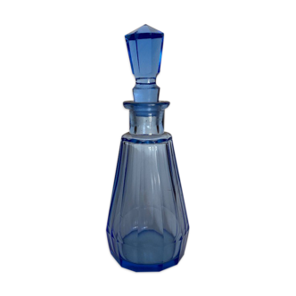 Blue chiseled glass bottle
