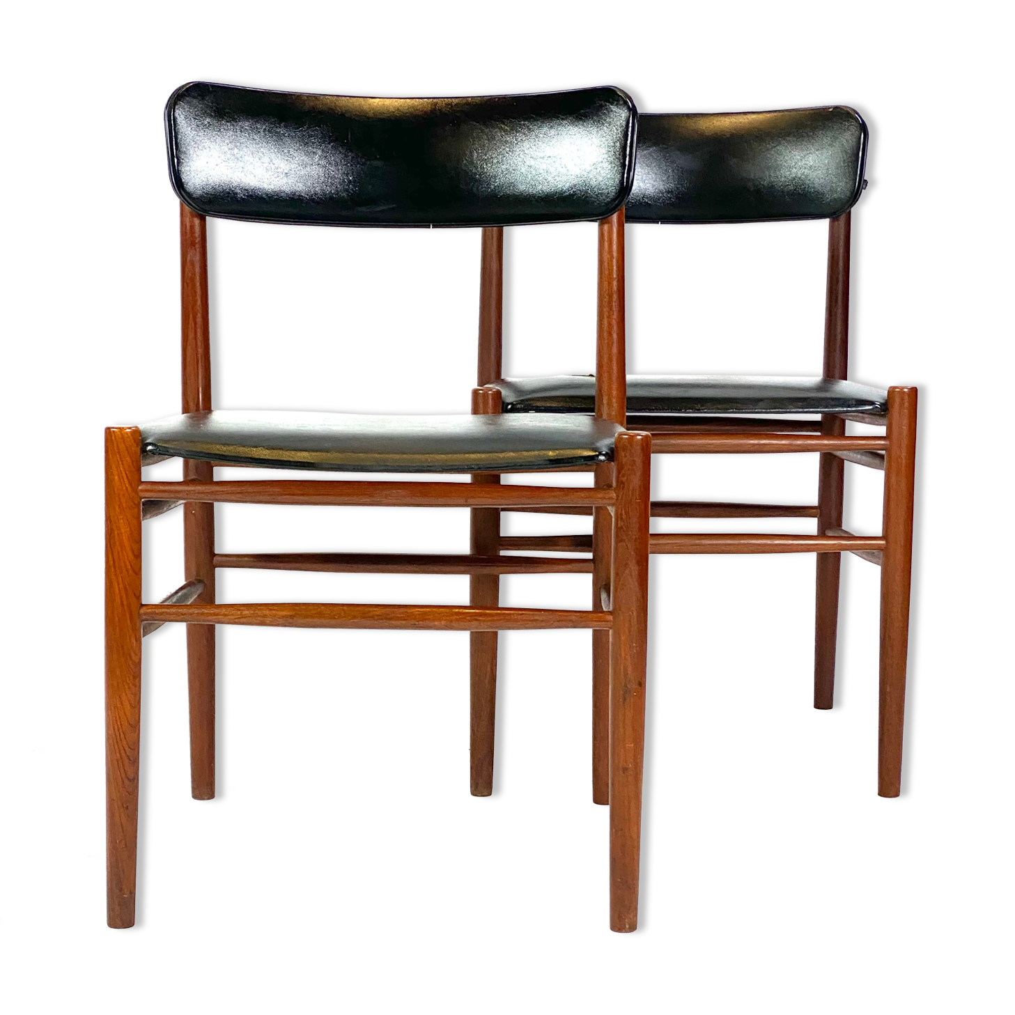 Two dining room chairs in teak and upholstered with black leather of Danish design, 1960s