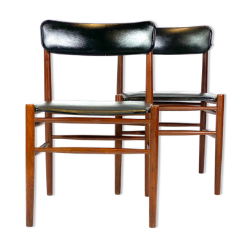 Two dining room chairs in teak and upholstered with black leather of Danish design, 1960s