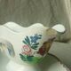 Sauceboat in faience decorated with a rooster, Sarreguemines, Nord of France.