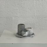 Set of marble candle holders with base