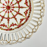 Pair of openwork porcelain plates decorated with roses