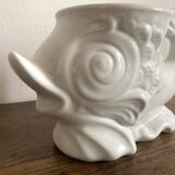 Zoomorphic fish pot cover in slip