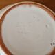 Henriot in Quimper - Glazed terracotta salad bowl with green flower decoration