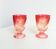 Pair of antique Baccarat glasses in gradient red and pink.