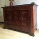 Commode Louis Philippe bois et marbre noir, 4 tiroirs
