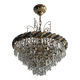 Crystal and brass chandelier with a cascade of pendants.