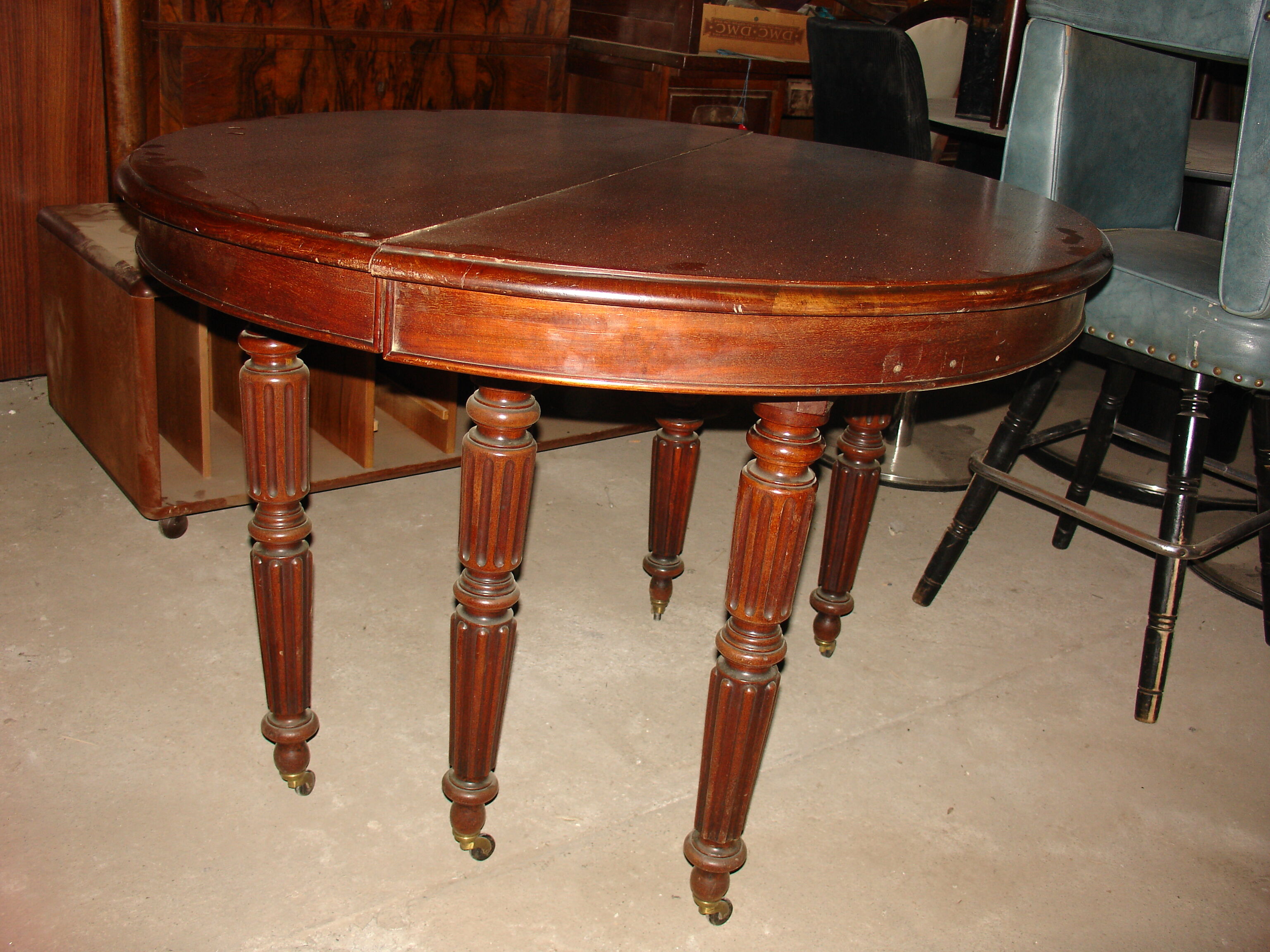 Table 6 pieds à bandeau époque Louis Philippe en acajou de cuba