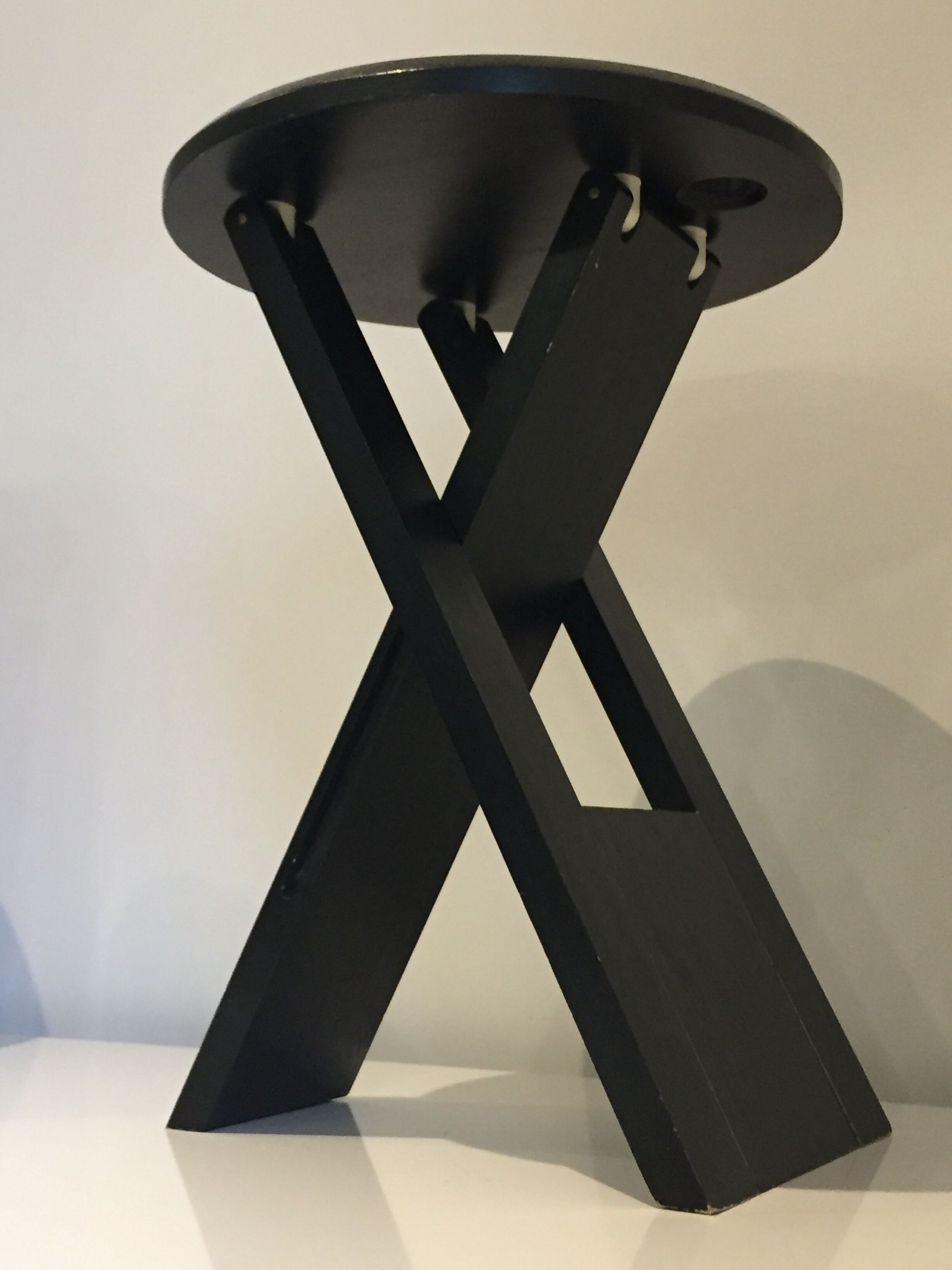 Suzy stool Adrian Reed black folding stool, 1980s design