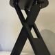 Suzy stool Adrian Reed black folding stool, 1980s design