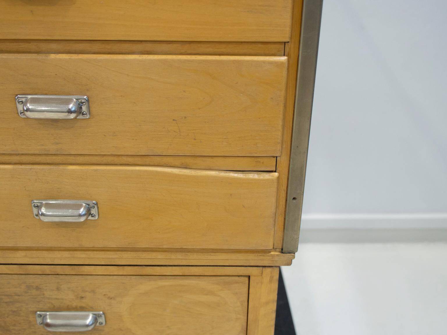 Shop counter made of birch and oak with twenty drawers, 1940s.