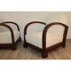 Pair of modernist armchairs in wood and buckle fabric, 1940