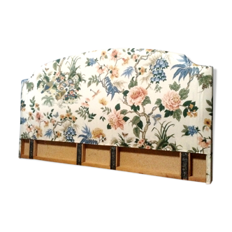 Old bedhead upholstered