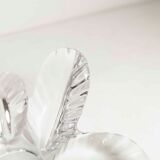 Empty floral pocket crystal of transparent arques signed