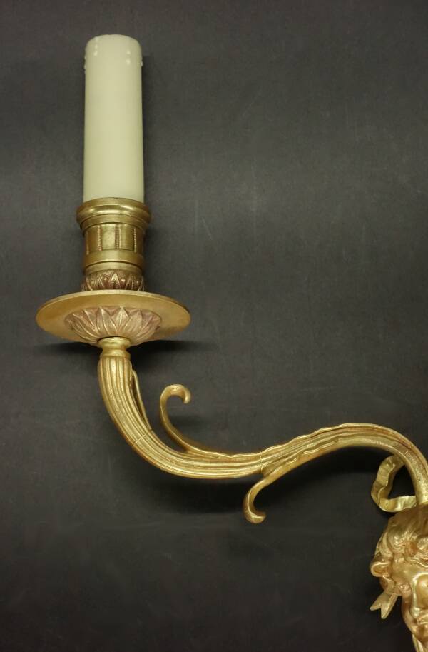 Pair of large Louis XVI style sconces with male faces - bronze