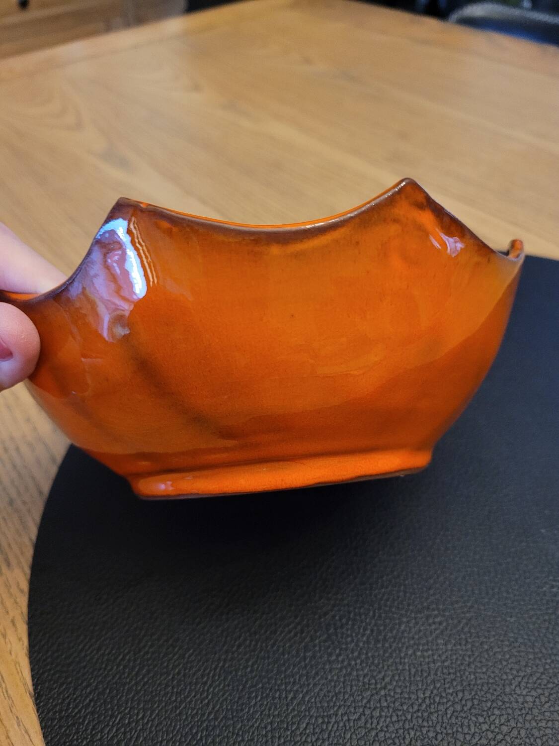 Orange ceramic star-shaped empty bowl