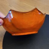 Orange ceramic star-shaped empty bowl