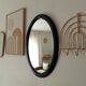 Vintage oval mirror in petrol blue wood