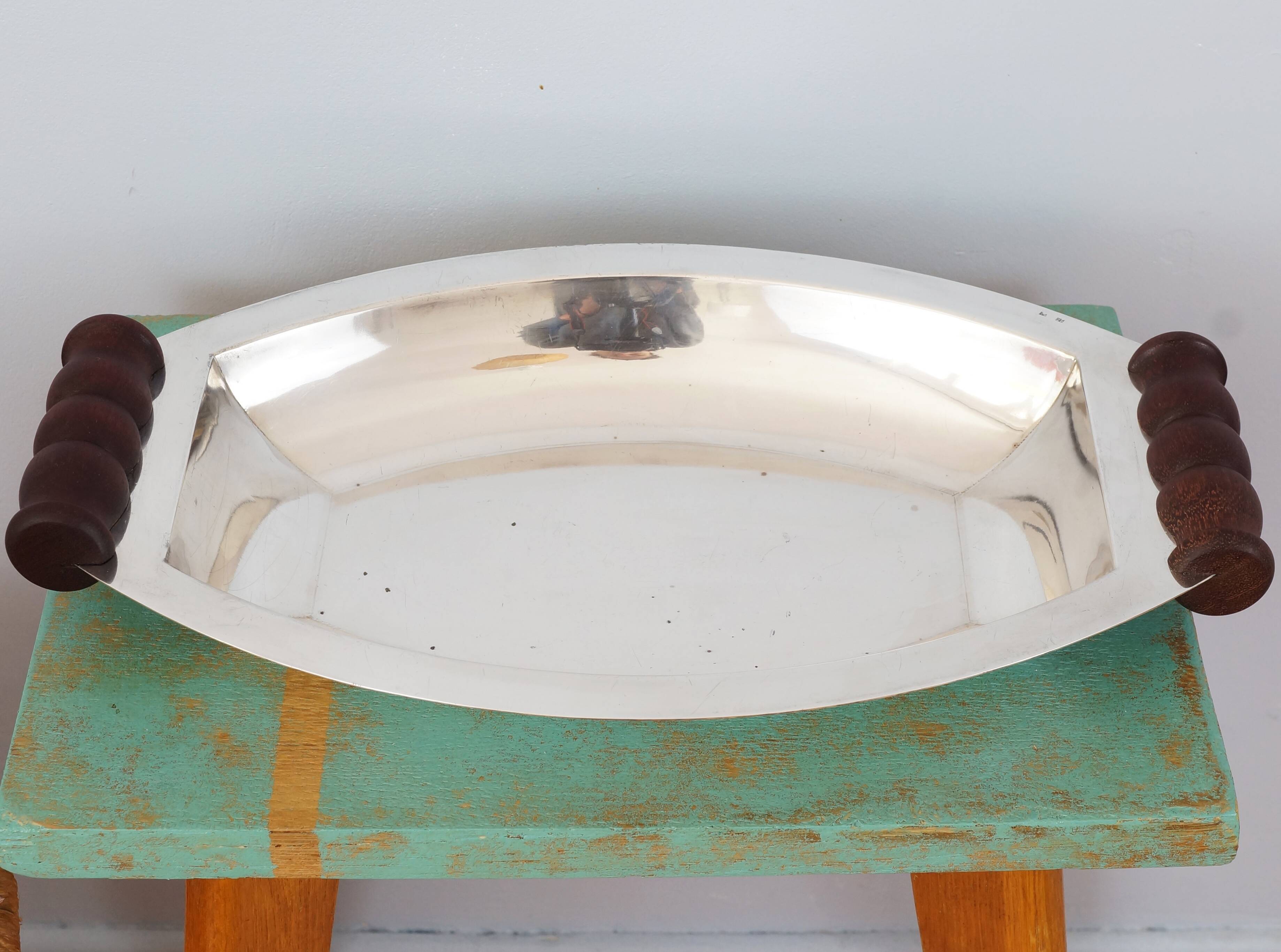 Silver plated metal hollow dish and mahogany handles