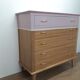 Commode vintage rénovée rose dorée