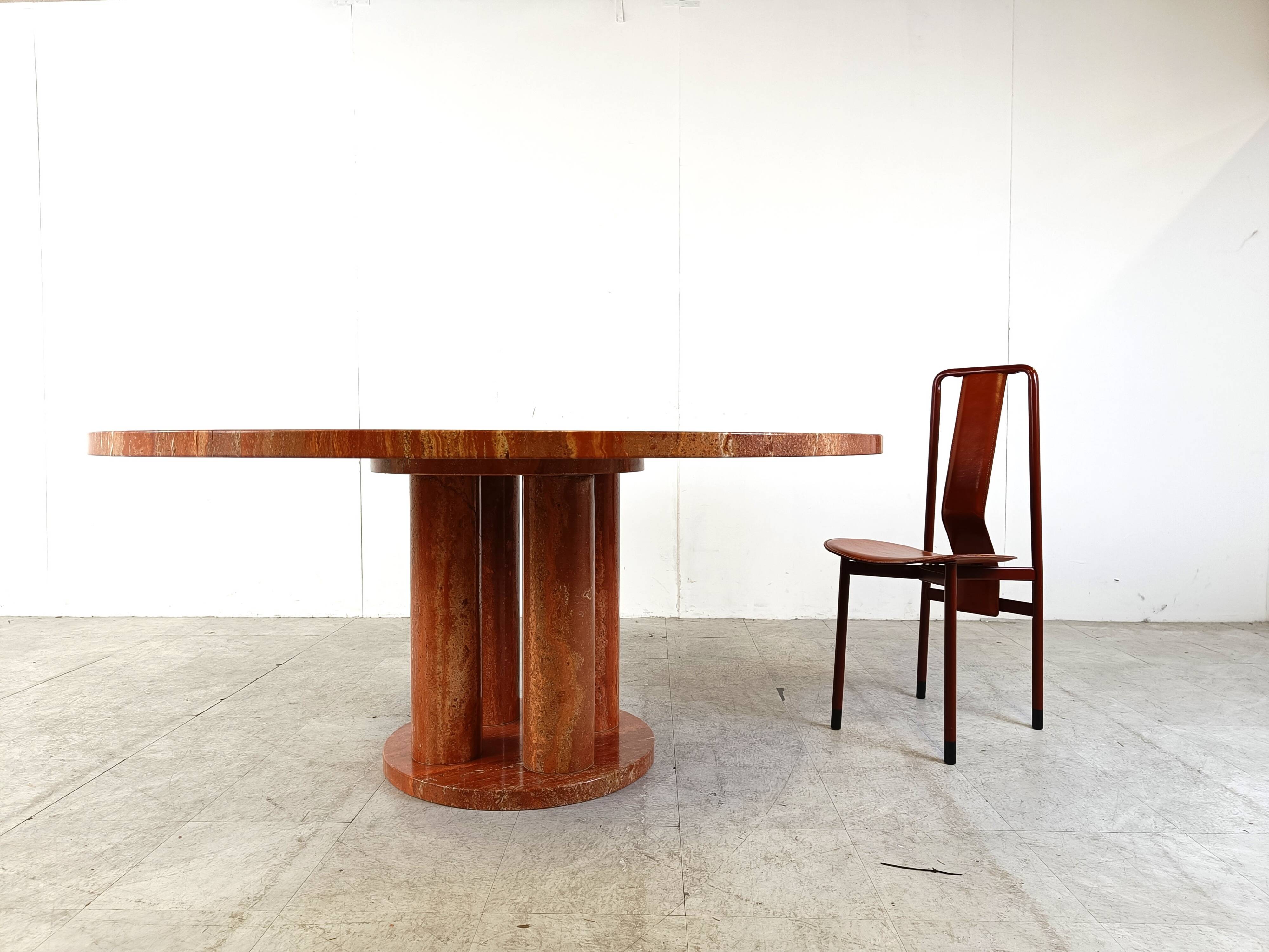 Large round red travertine dining table, 1970s