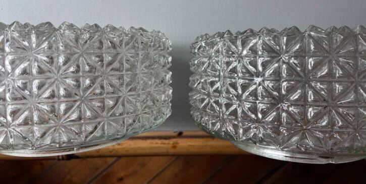 Pair of round vintage moulded glass ceiling lights.