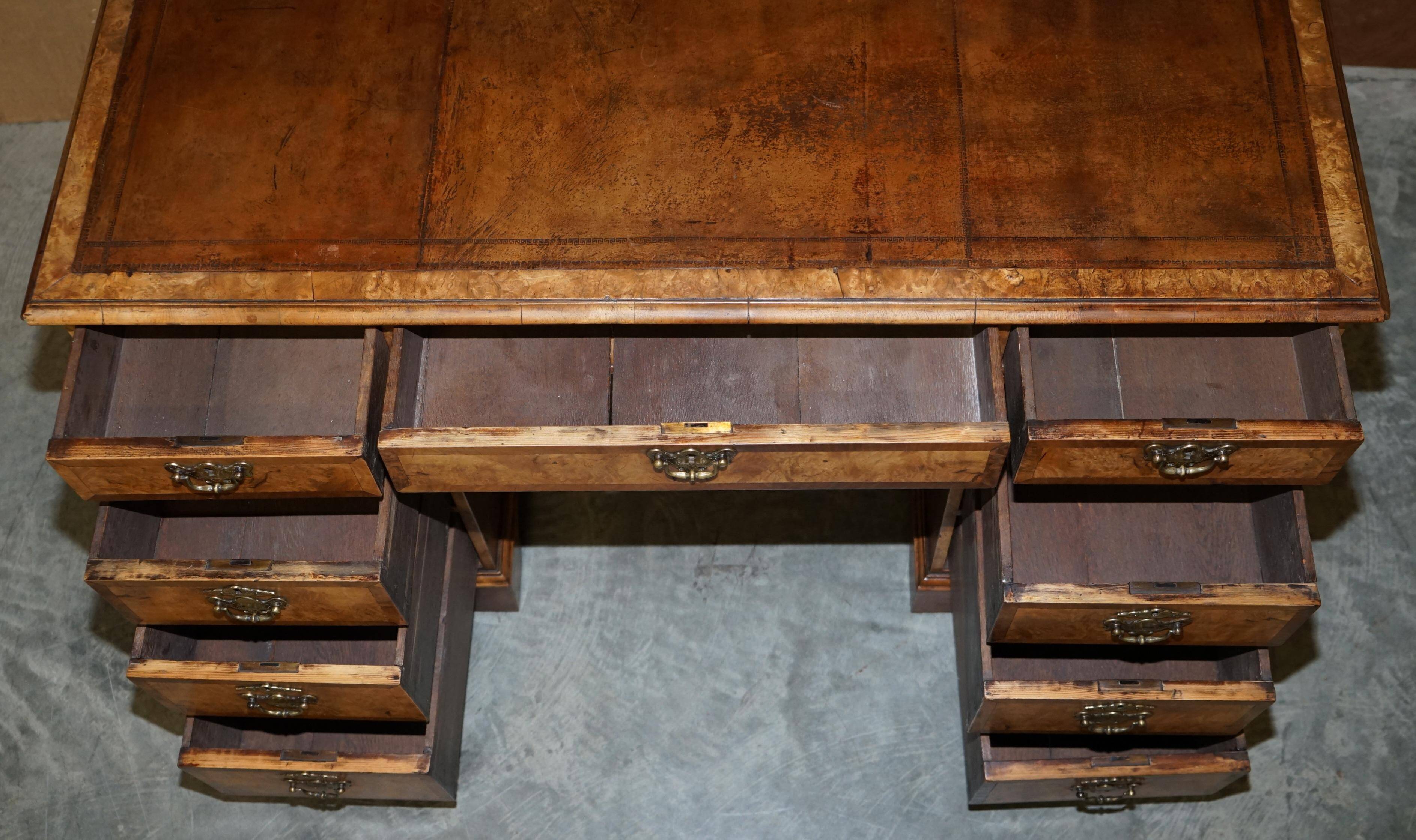 Antique Victorian desk with two pedestals in burr walnut and leather.