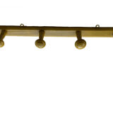 Old yellow wall coat rack