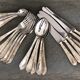 Series of 24 antique silver metal cutlery
