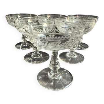 6 Baccarat champagne coupes with Greek engraving, slanted.