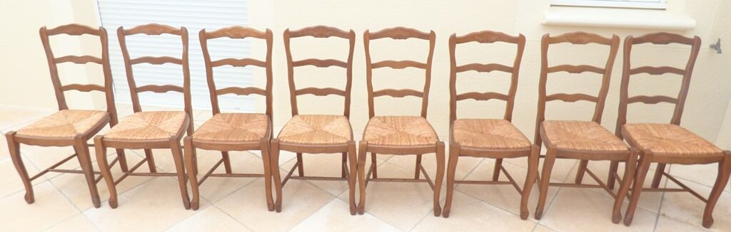 8 Straw chairs with high backs in solid wood