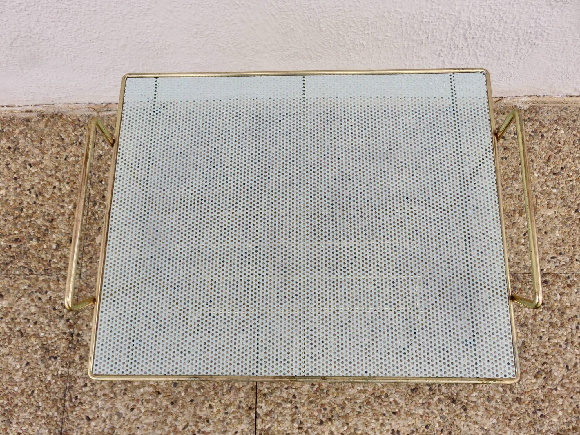 Side table for vinyl records in the style of Mathieu Mategot, perforated metal, 1960.