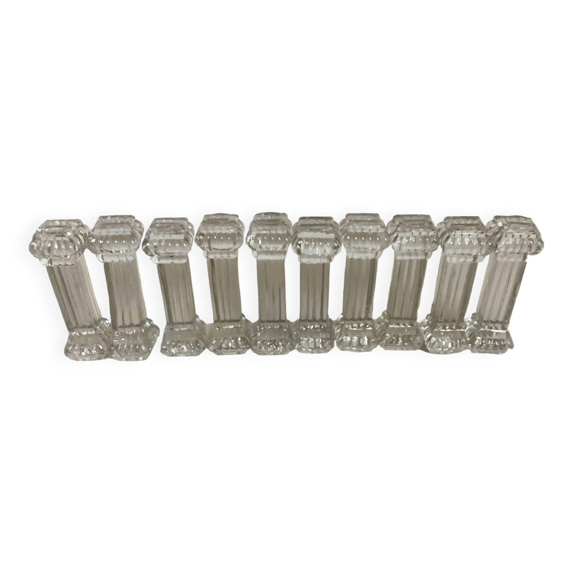 Ten old molded glass knife holders