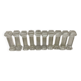 Ten old molded glass knife holders
