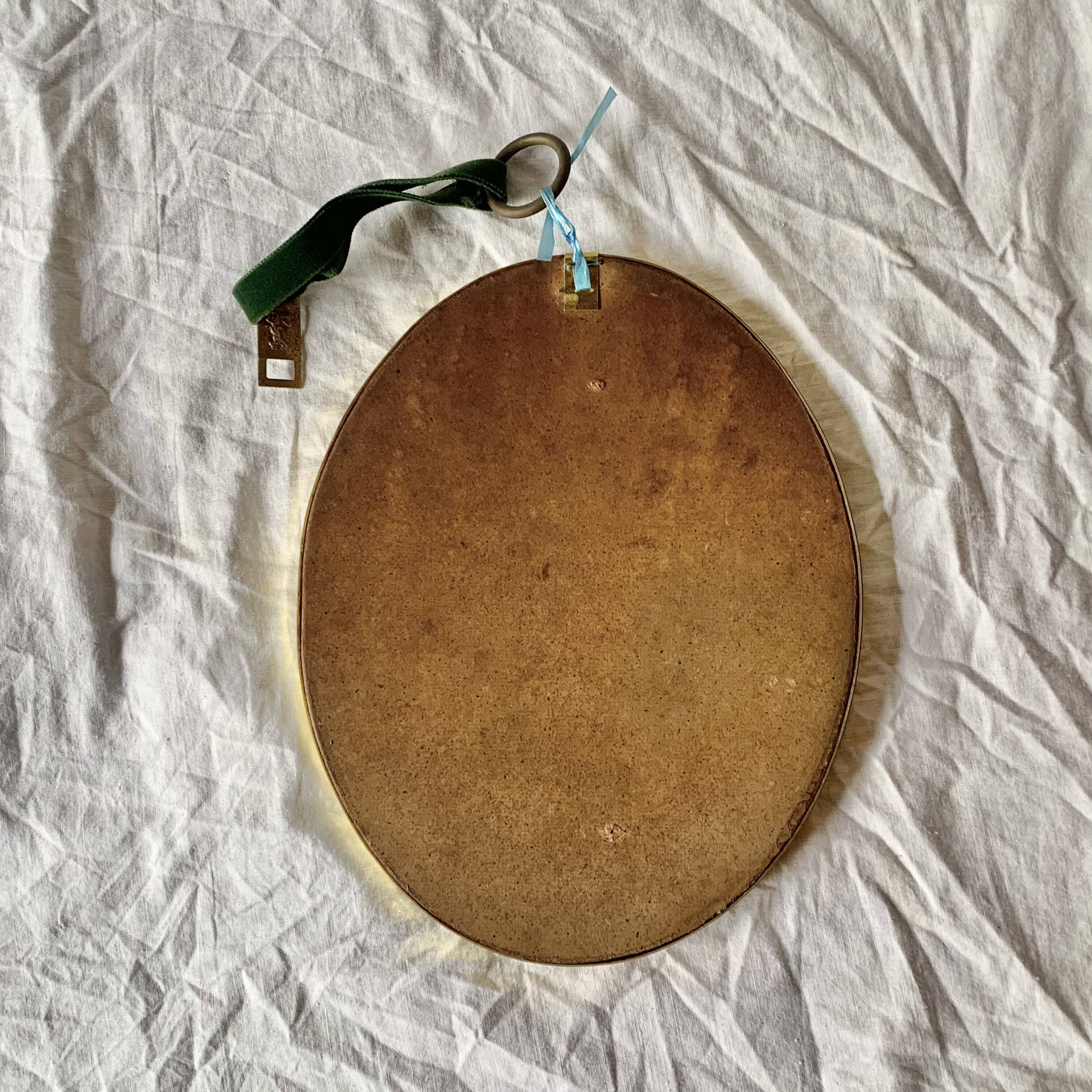 Oval medallion mirror 1960