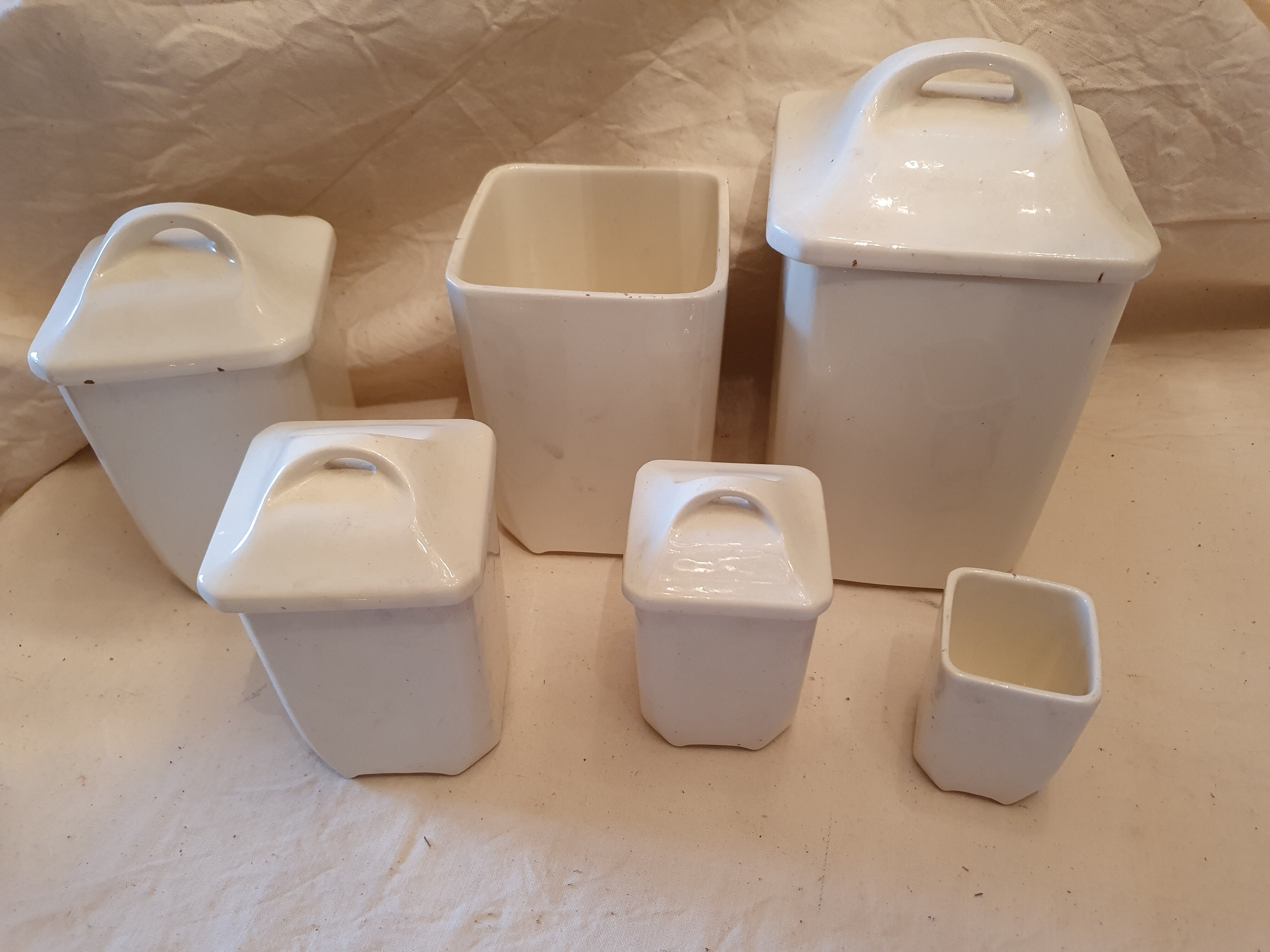 6 blue checkered jars