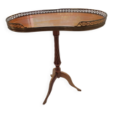 Tripod pedestal table. Bean shape with gallery.