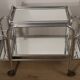 Vintage 1970s rolling dessert trolley in chrome metal and mirrored glass.