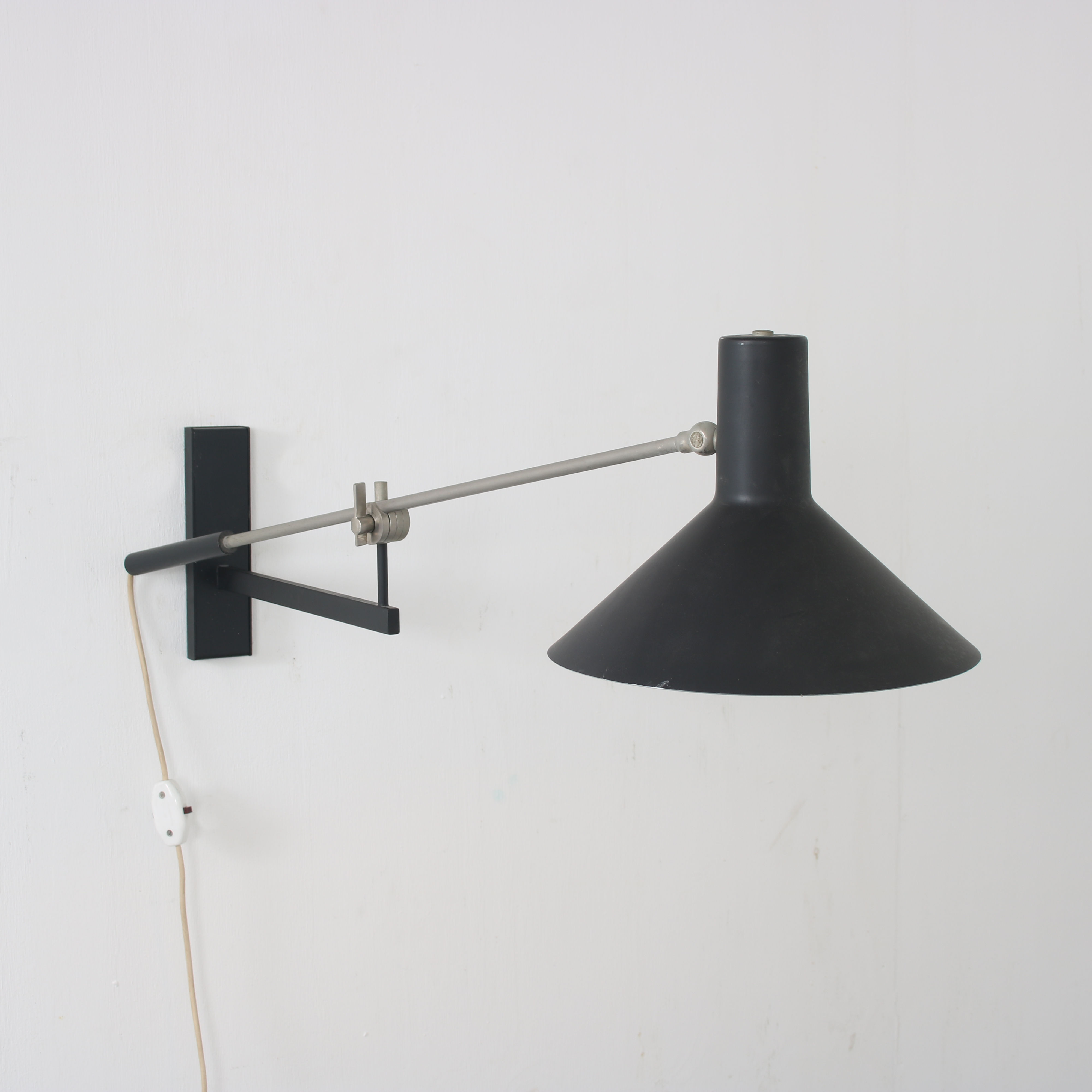 1960s Model “7105” wall lamp by J.J.M. Hoogervorst for Anvia, Netherlands