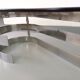 Vintage oval coffee table in smoked glass and chrome metal from the 1970s.