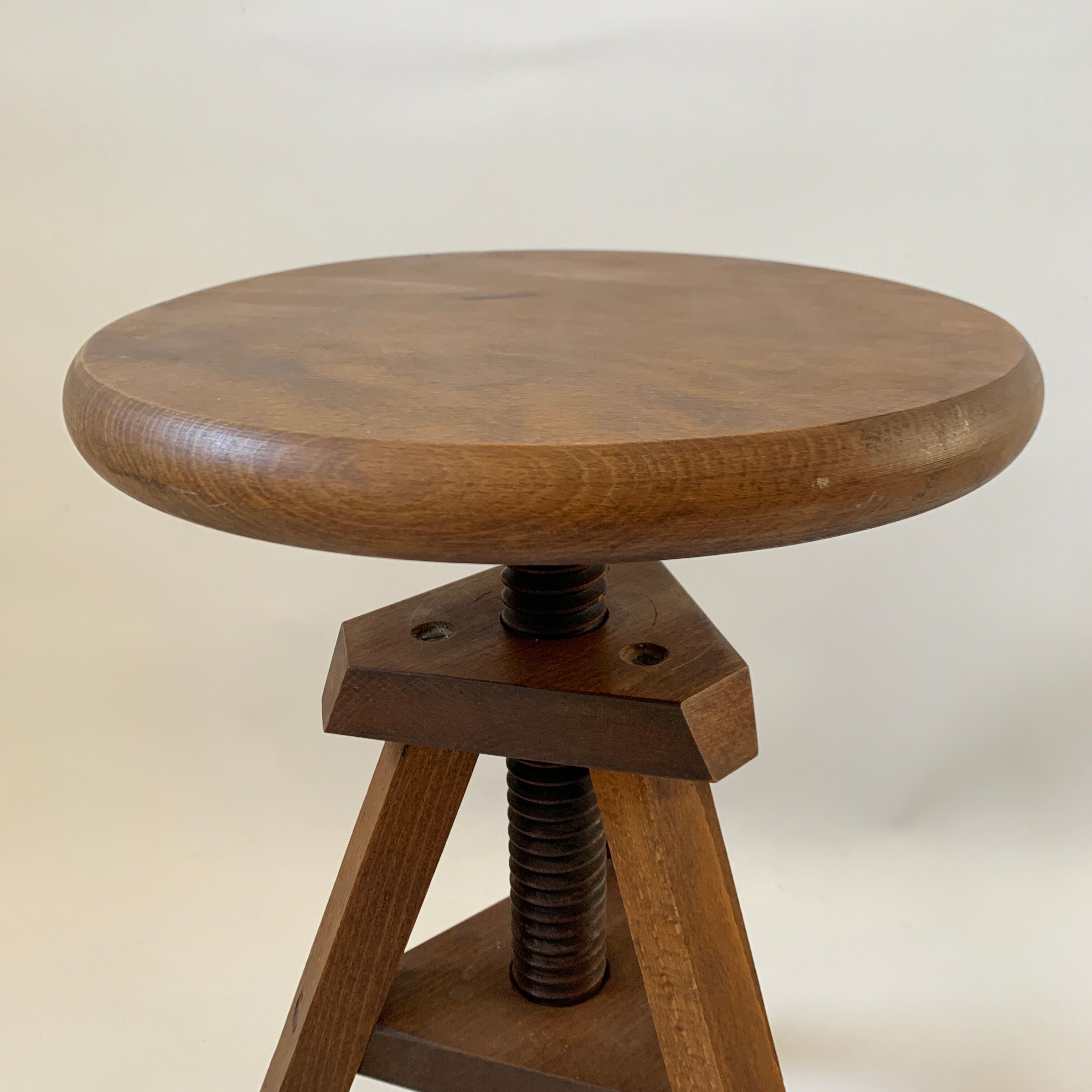Wooden tripod stool with vintage screw