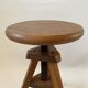 Wooden tripod stool with vintage screw
