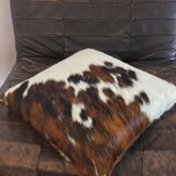 Pouf and cow cushion, leather