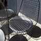 Set of 4 Eames chairs in metal