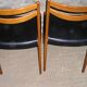 Scandinavian wood and leather chairs