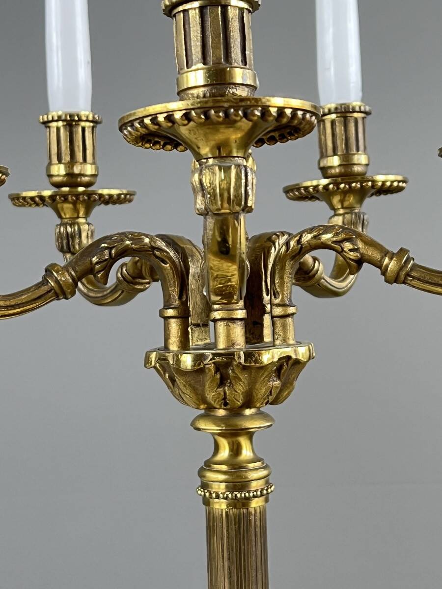 Pair of gilded bronze candelabra with 5 lights, Louis XVI style, 20th century.