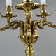 Pair of gilded bronze candelabra with 5 lights, Louis XVI style, 20th century.