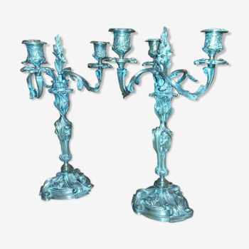 Pair of unsigned silver metal candelabra