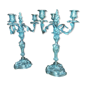 Pair of unsigned silver metal candelabra